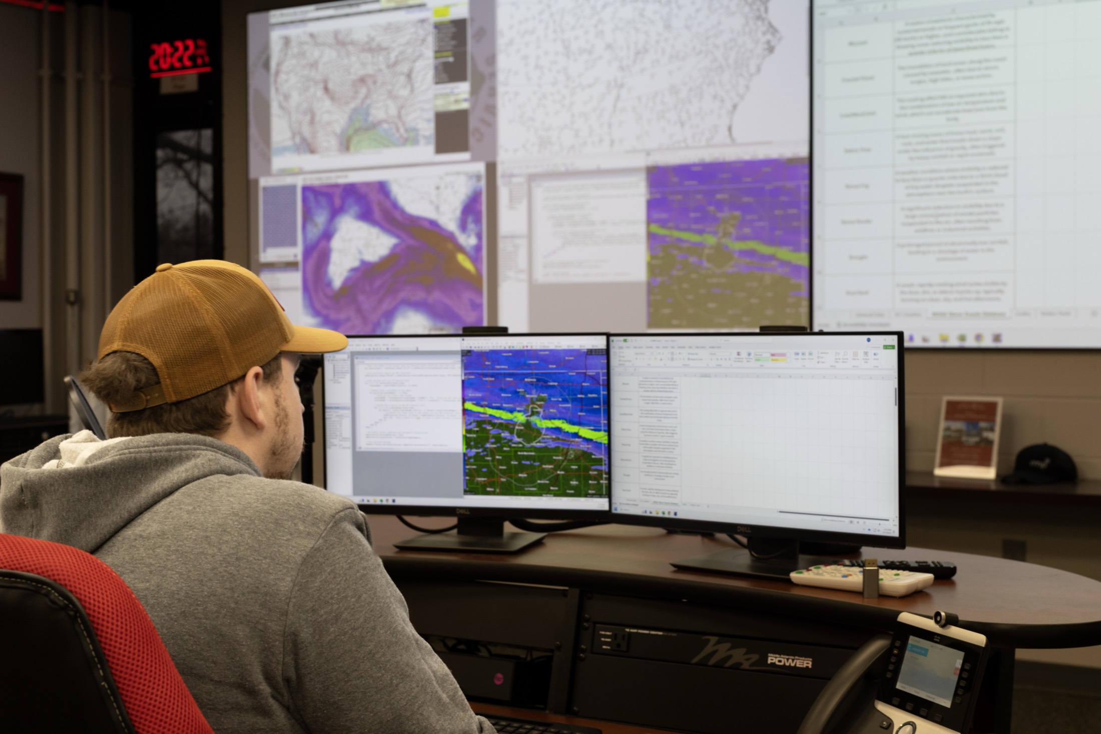 A DSOC student emergency manager at work in the operations center