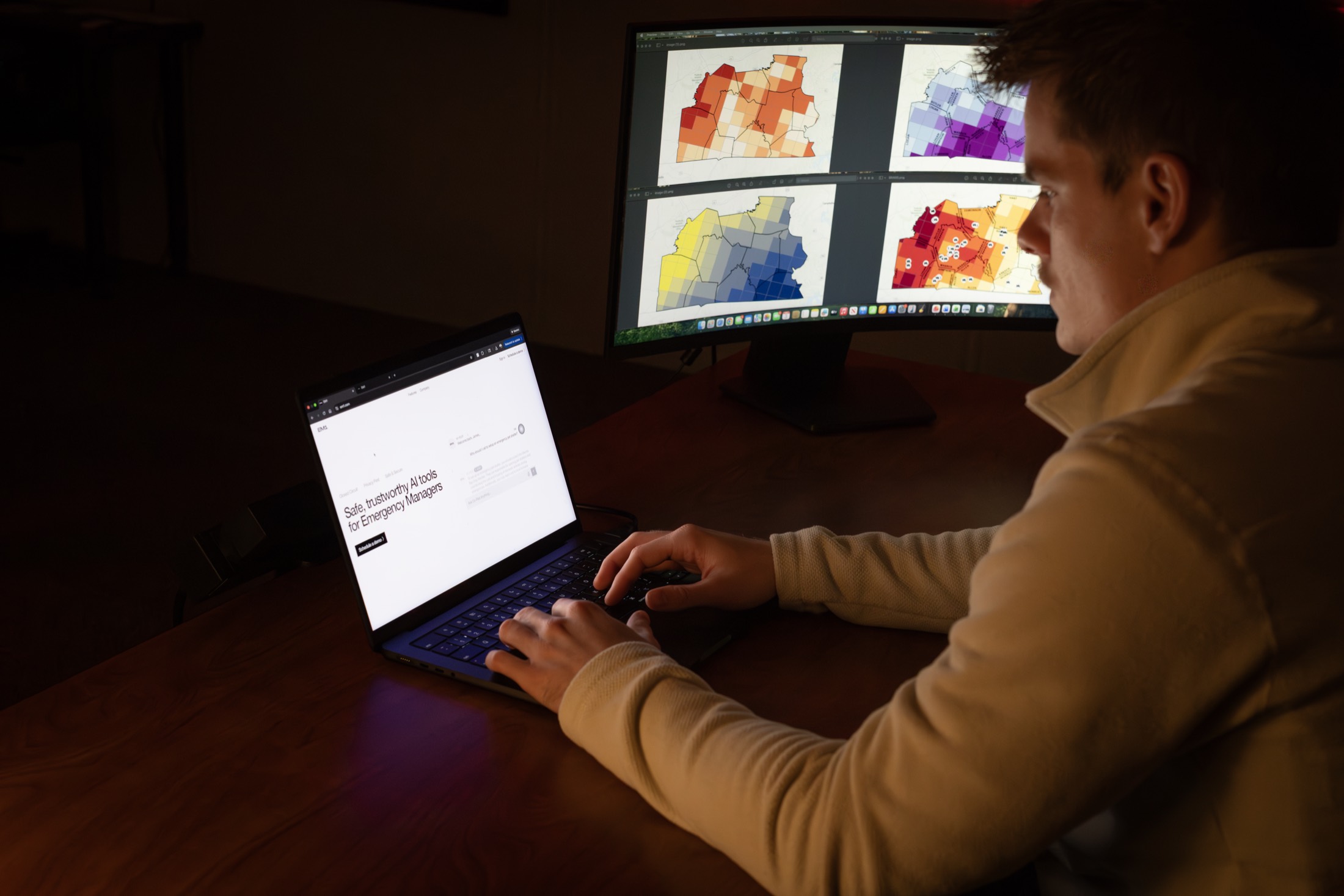 DSOC students and staff working with the EM1 AI-powered emergency management platform